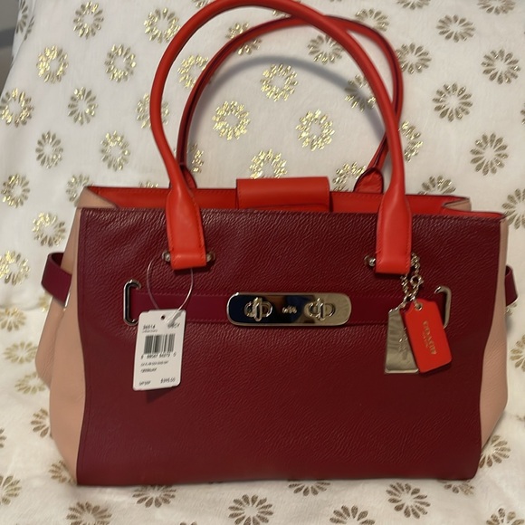 Coach. Never used. Three colors. Xlnt. Swagger carry-all. - Picture 3 of 4